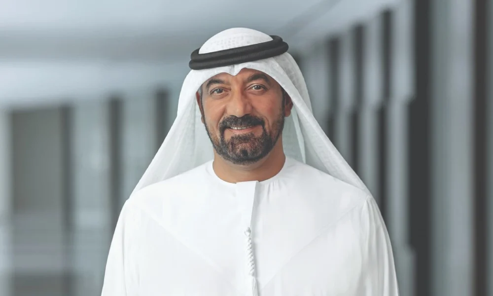 Ahmed Bin Saeed Al Maktoum smiling in traditional Emirati attire, representing his success and Ahmed Bin Saeed Al Maktoum Net Worth in Dubai’s business world.
