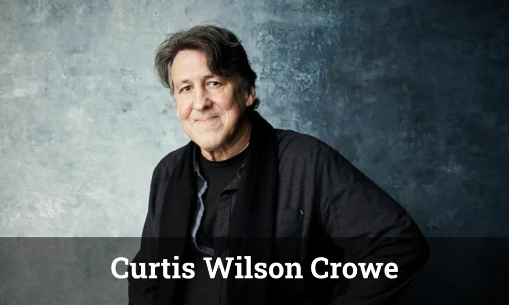 Curtis Wilson Crowe drumming live on stage with The Army, immersed in the music.