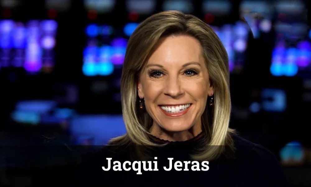Jacqui Jeras presenting a weather forecast with a storm map in the background.