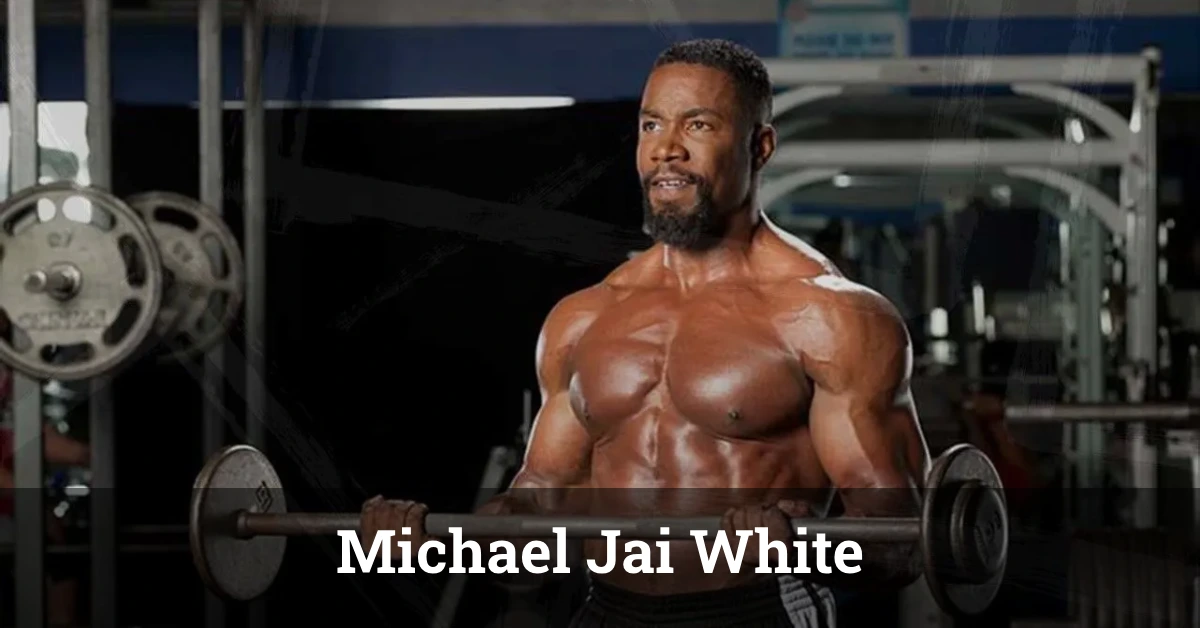 Michael Jai White performing a martial arts move, highlighting his expertise as an action star and martial artist.
