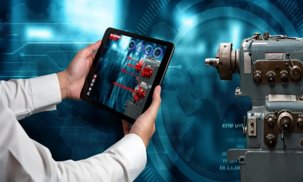Manguonmienphi 2025: The Ultimate Guide to Free Educational Resources and Digital Tools Person using a tablet to access Manguonmienphi's interactive digital learning platform while monitoring industrial equipment in a high-tech environment with futuristic blue interface.