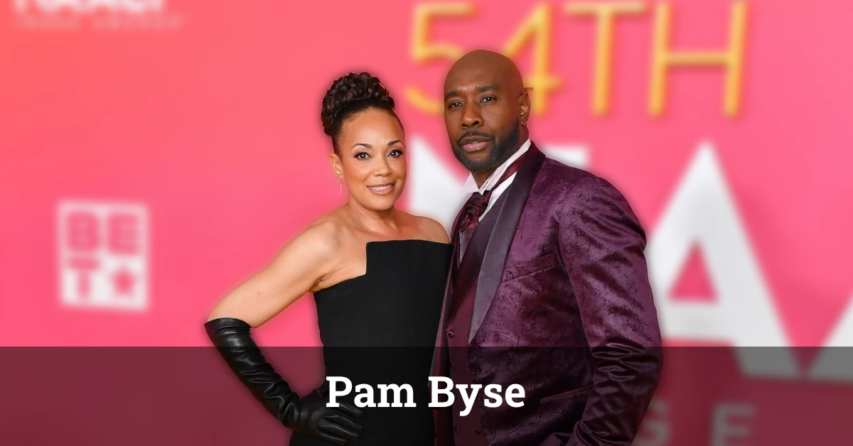 Pam Byse and Morris Chestnut at a formal event, smiling together.