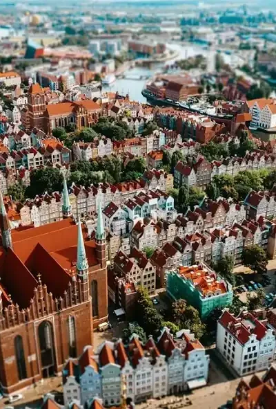 Aerial view of a historic Polish city showcasing cultural heritage, relevant to regaining Polish citizenship and exploring ancestral roots.