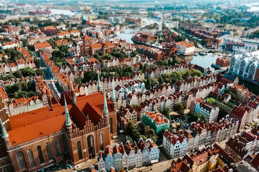 Aerial view of a historic Polish city showcasing cultural heritage, relevant to regaining Polish citizenship and exploring ancestral roots.