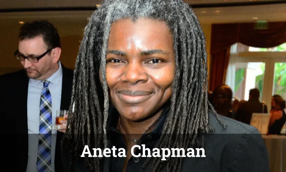 Aneta Chapman: The Untold Story Behind Tracy Chapman’s Success (2025 Update) Person with long dark dreadlocks at formal event - labeled as Aneta Chapman