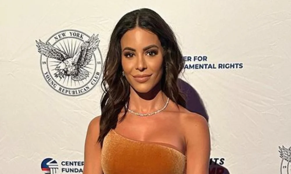 Charly Arnolt: From WWE Ring to UFC Cage – The Rise of a Sports Broadcasting Powerhouse Charly Arnolt stands confidently at a formal event, capturing her poised presence and media influence featured in our article on Charly Arnolt.