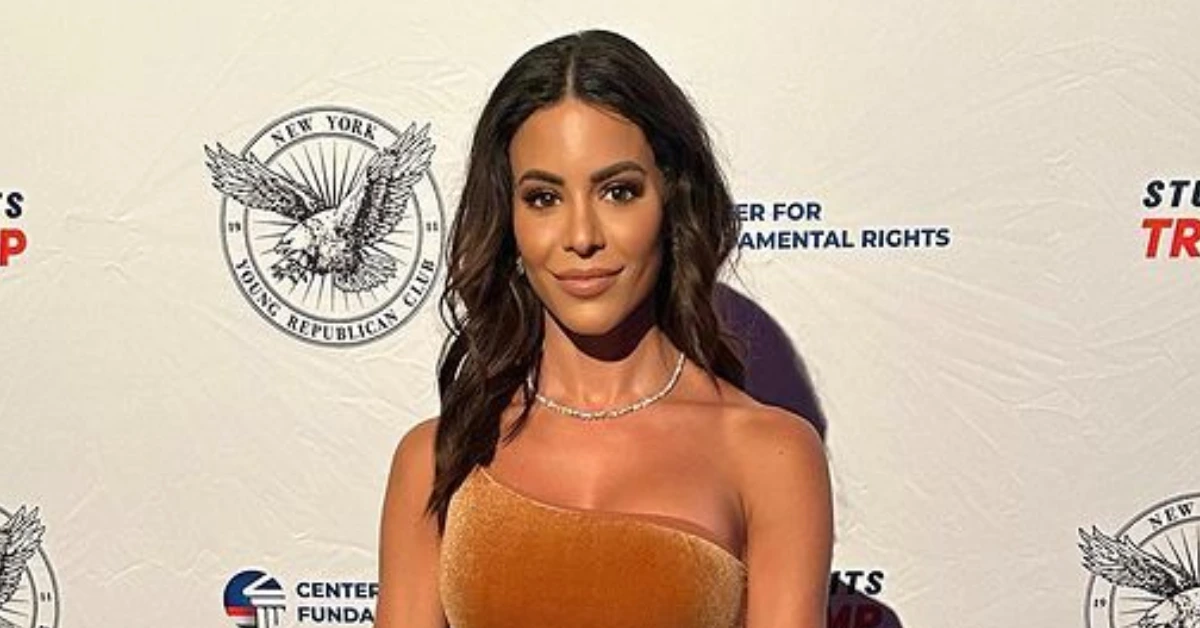 Charly Arnolt stands confidently at a formal event, capturing her poised presence and media influence featured in our article on Charly Arnolt.