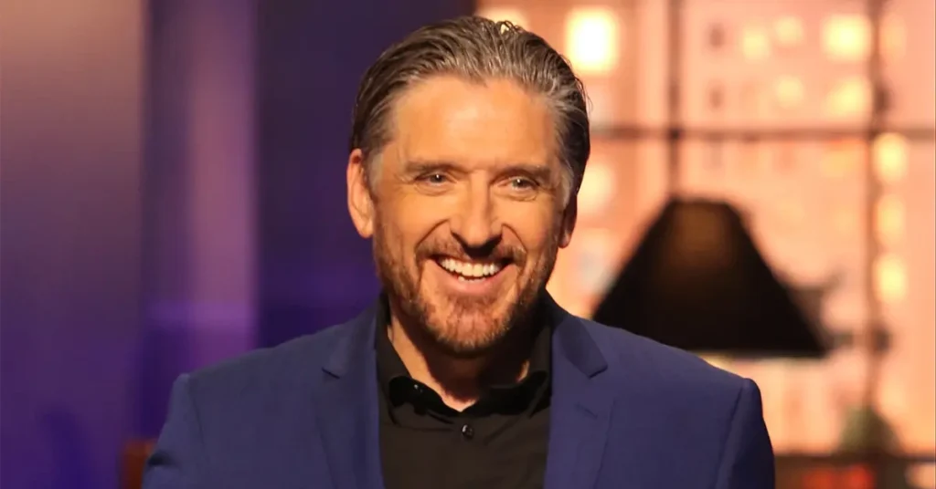 Craig Ferguson on set, smiling in a sharp blazer—capturing the charisma and legacy of the late-night icon in 2025.