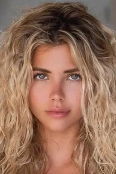 Nata Lee, Instagram's popular Russian model and DJ, with wavy blonde hair and striking blue eyes in a professional portrait