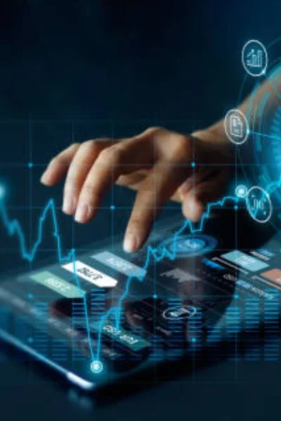 Hands interacting with a digital tablet surrounded by futuristic icons and data graphs, symbolizing the impact of Iversær on tech-driven industries.
