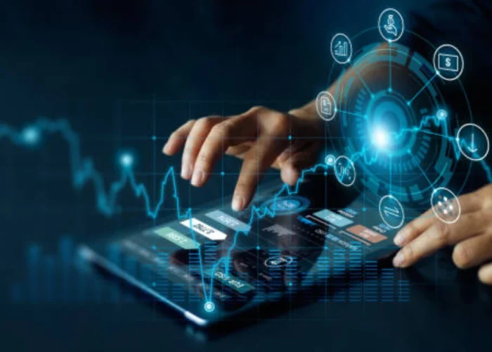 Hands interacting with a digital tablet surrounded by futuristic icons and data graphs, symbolizing the impact of Iversær on tech-driven industries.