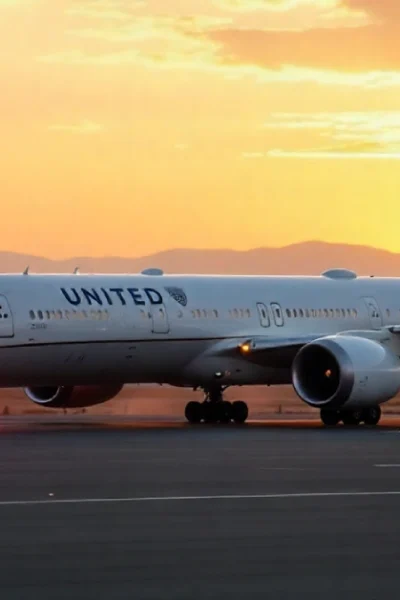 United Airlines Flight UA770 emergency diversion Boeing 787 safely landed Denver airport with emergency vehicles on runway